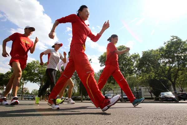 China's national race-walking team is preparing for the London Games through training in Beijing. Race-walkers train for London Games in Beijing