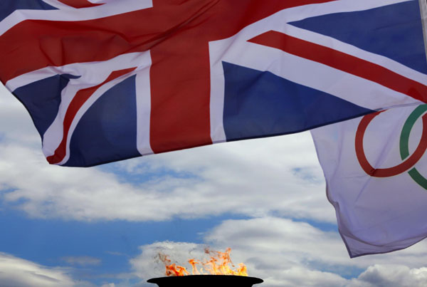The flame for the London Olympics, which will start on July 27 after a 70-day torch relay around Britain, was handed over on Thursday at a damp ceremony in the marble stadium that hosted the first modern Games in 1896. London receives flame in rainy Athens