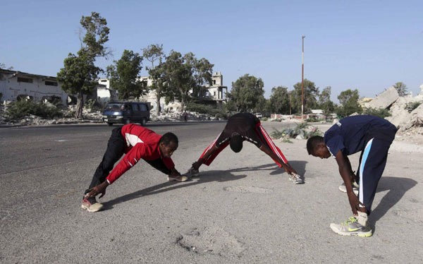 Training in a bullet-riddled stadium where the remains of a rocket propelled grenade lies discarded on the track's edge counts as progress for Somali Olympic hopeful Mohamed Hassan Mohamed. In former rebel camp, Somali athletes eye London