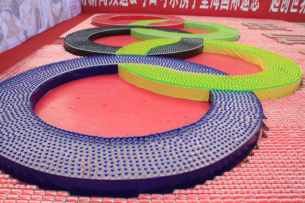 Five Olympic rings made from beverage bottles in Haikou, capital of South China’s Hainan province, July 28, 2012. Thirst for Olympic success