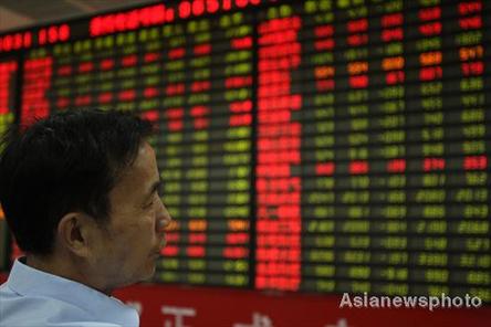 Stocks slide to lowest in 19 months