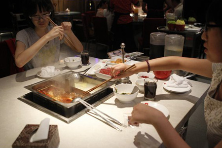 Popular hotpot chain admits to using 'bone glue'
