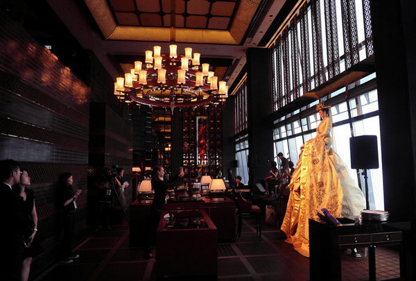 Staff members prepare for the opening ceremony of a Ritz-Carlton Hotel in Hong Kong, south China, May 3, 2011. World's highest hotel opens in Hong Kong
