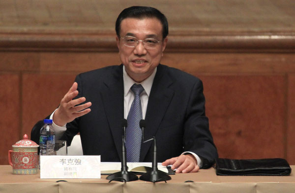 China's Vice-Premier Li Keqiang speaks to the Hong Kong representatives of the sectors of business, industry and other groups in a meeting during his visit to the SAR, August 16, 2011. Li meets Hong Kong businesspeople, professionals