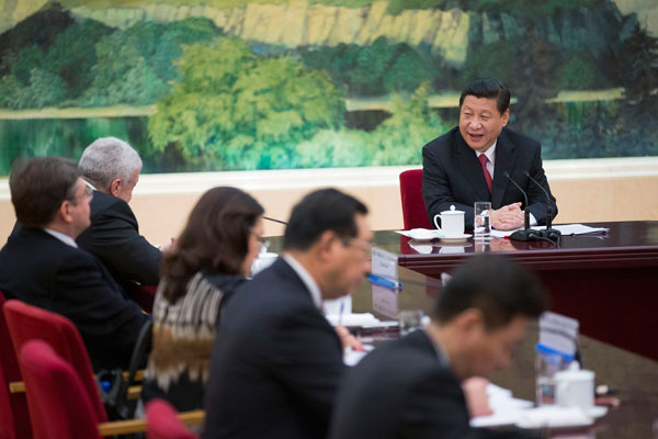 President Xi Jinping tells reporters from BRICS countries on Tuesday in Beijing that he expects the BRICS leaders summit will send a positive message to the global community. Lan Hongguang / Xinhua BRICS work together for a balanced world