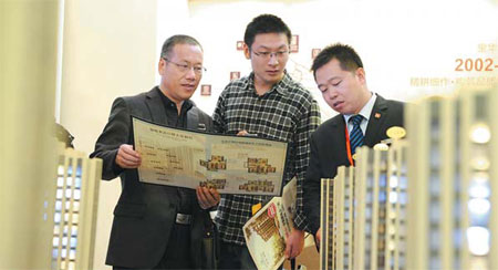 Property prices in China's major cities saw an 11th consecutive monthly increase in April, but the growth rate slowed as the government's latest tightening policies gradually kicked in. Lai Xinlin / for China Daily Real estate continues its climb