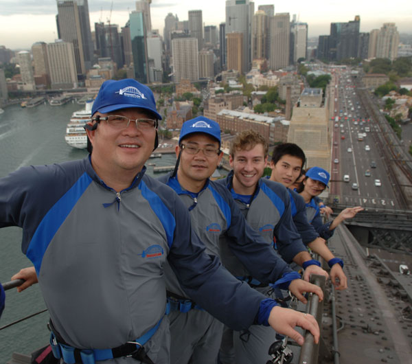 Chinese tourists climb the Sydney Harbor Bridge with Matthew Mitcham (third from the left), the Australian diver who took the gold medal at the 2008 Beijing Olympics, on Feb 3, 2011, to celebrate the Chinese Spring Festival. The luxury of travel