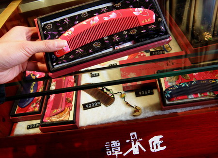 Comb maker brushes up brand image