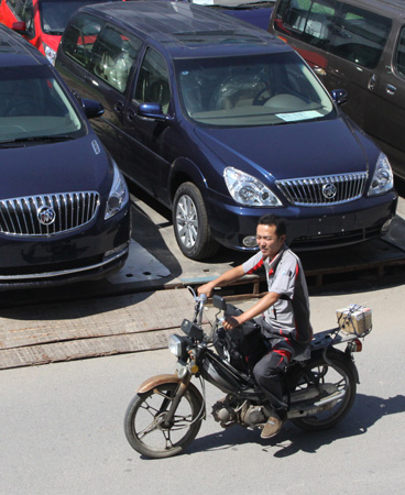 Vehicle makers scour world for proven talent