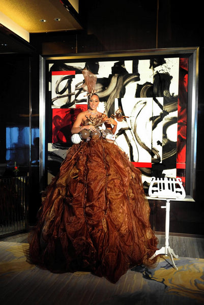 A model prepares for the opening of a Ritz-Carlton Hotel in Hong Kong, south China, May 3, 2011. World's highest hotel opens in Hong Kong