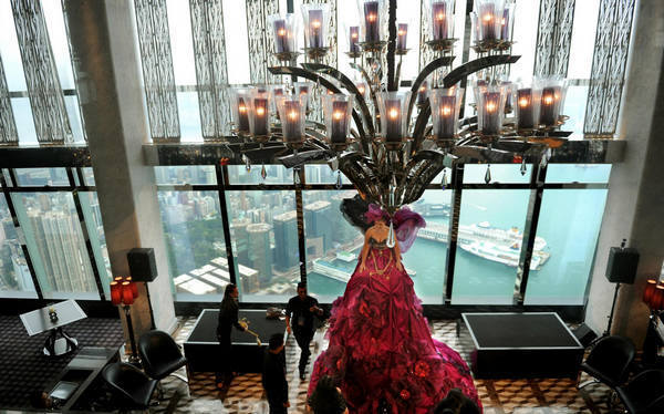 Staff members prepare for the opening ceremony of a Ritz-Carlton Hotel in Hong Kong, south China, May 3, 2011. World's highest hotel opens in Hong Kong