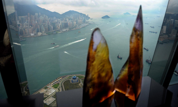 Photo taken from the 112th floor of the Ritz-Carlton Hotel on May 3, 2011 shows the scene of the Victoria Harbour in Hong Kong, south China, May 3, 2011. World's highest hotel opens in Hong Kong