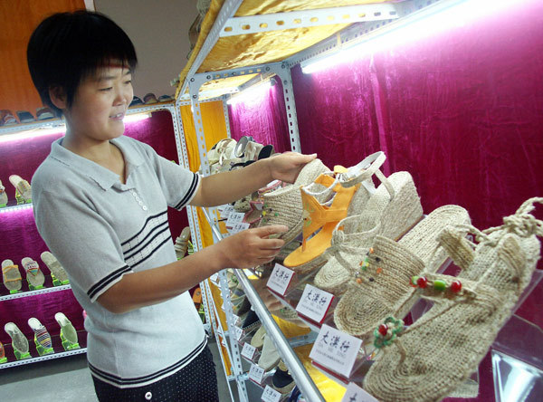 emp shoes are shown in a shop in Gansu province. Hemp shoes a hit in foreign markets