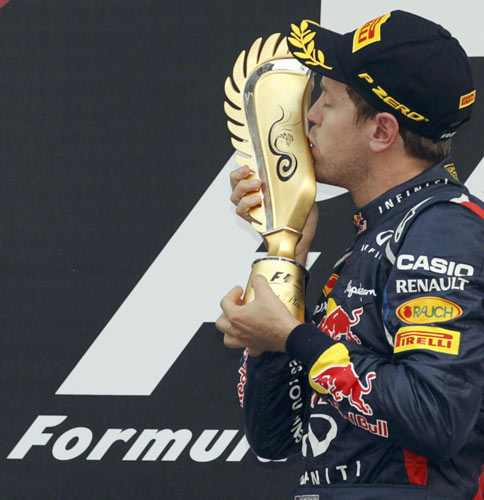 World champion Sebastian Vettel won the South Korean Grand Prix in a Red Bull one-two finish on Sunday to take the overall Formula One lead from Ferrari's Fernando Alonso with four races remaining. Vettel wins to seize F1 lead from Alonso
