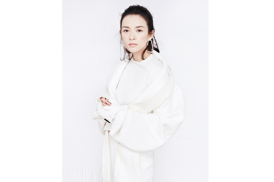 Actress Zhang Ziyi poses for fashion magazine