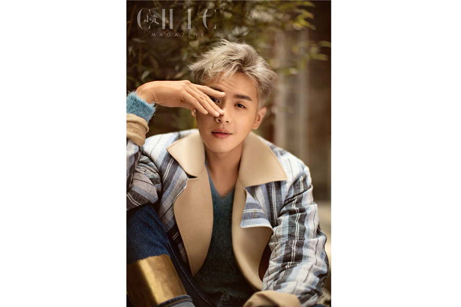 Actor Zhang Ruoyun poses for fashion magazine