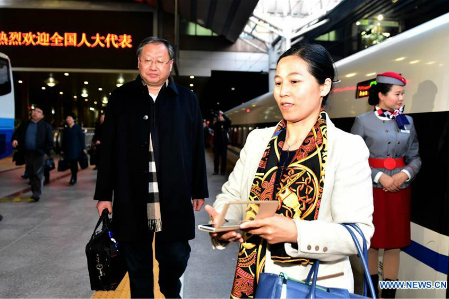 Deputies to 12th NPC arrive in Beijing