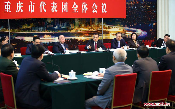 Chinese leaders press reform, development