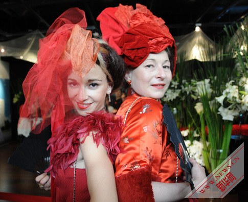 Bold scarlet , wild Versailles roses highlight in French Pavilion