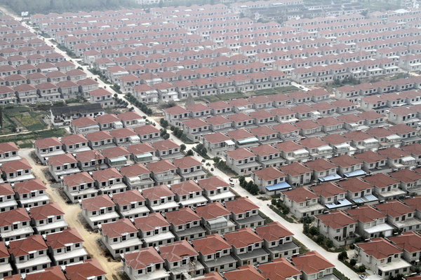 Rows of houses in Huaxi village, Jiangsu province, Sept 28, 2011. Lavish hotel opens in China's richest village