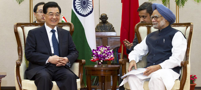 At summit end, Hu, Singh talk