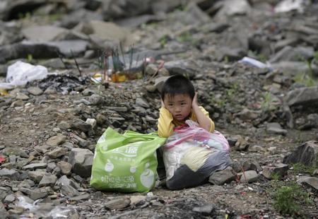 Quake survivors mourn as anniversary nears