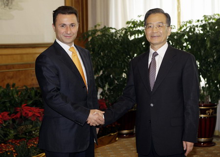 Premier Wen meets foreign officials during WEF in Dalian