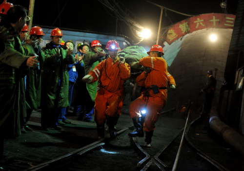Dozens rescued after week in flooded mine