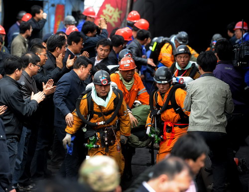 115 survivors rescued from flooded mine, 38 still trapped