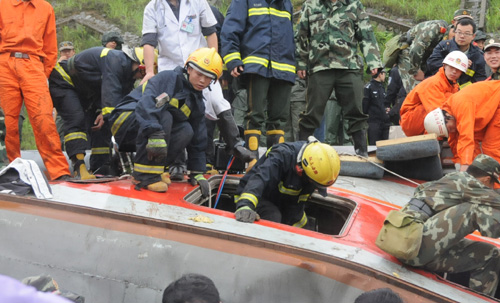 Death toll from China train derailment hits 19