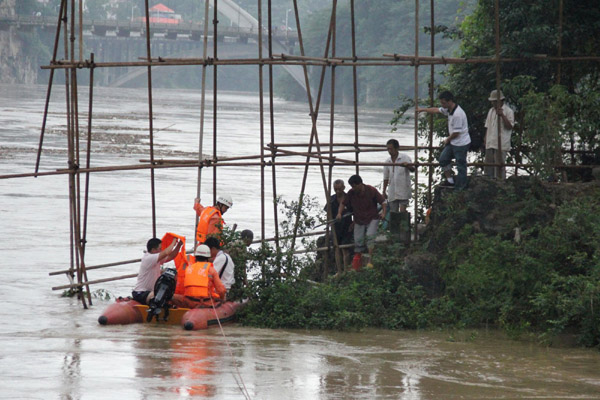 12,000 evacuated as floods wreck havoc in SW China