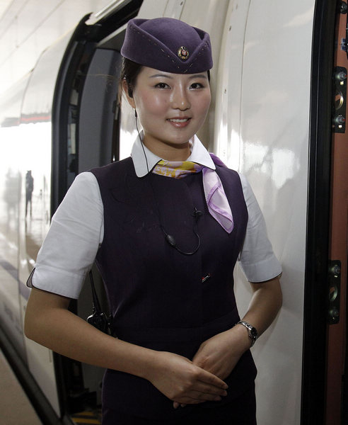 Guo Chaonan, 20, a new graduate majoring in air flight service, will serve on the Beijing-Shanghai high-speed train. Yong Kai / for China Daily All aboard new career