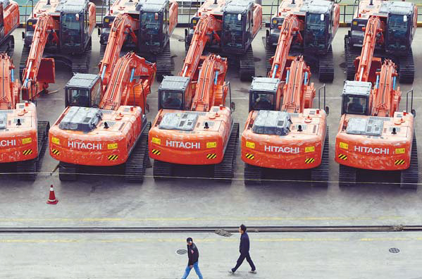 Car makers pushed to build abroad