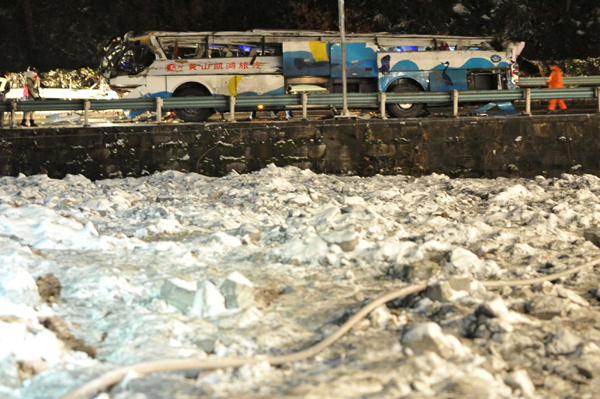 At least 18 killed after tourist bus falls off highway bridge in SW China