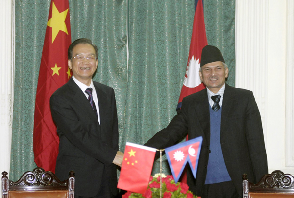 China and Nepal pledged to further relations as Premier Wen Jiabao wrapped up an official visit to the Himalayan nation on Saturday. Wen embraces 'good neighbor' Nepal