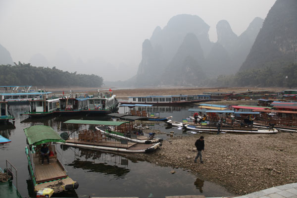 Rafts scattered at a harbor in Xingping township, the Guangxi Zhuang autonomous region, January, 2012. River protection rules cut into incomes