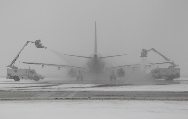 Snow brings travel delays as it clears the air