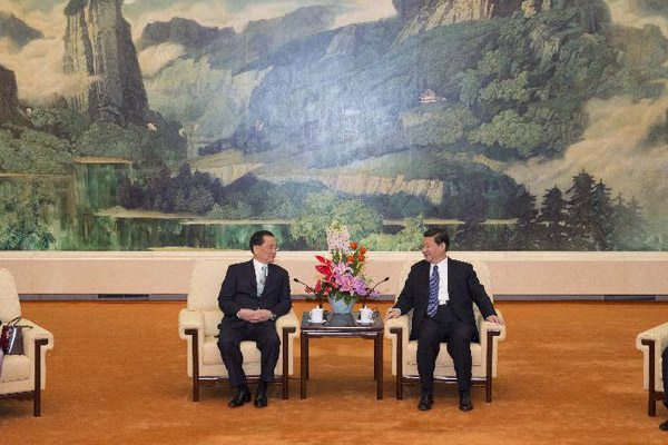 General Secretary of the Communist Party of China (CPC) Central Committee Xi Jinping (right) meets with visiting Honorary Chairman of the Kuomintang Lien Chan at the Great Hall of the People in Beijing, Feb 25, 2013. Xi Jinping meets KMT honorary chairman