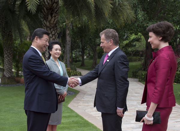 President Xi Jinping and his wife Peng Liyuan greet Finnish President Sauli Niinisto and his wife Jenni Haukio in Sanya, Hainan province, on Saturday. Xi will give a keynote speech at the Boao Forum for Asia on Sunday. China-Zambia relations a model of win-win approach