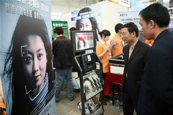 An attendance checking and access machine, based on face recognition technology, being displayed at an exhibition in Shenyang, Liaoning province, on April 23, 2009. Huang Jinkun / for China Daily Technology faces up to a question of identity