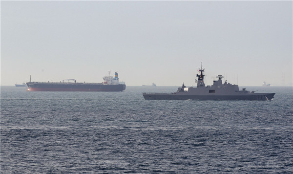 Taiwan military vessels take part in a joint marine drill with coast guard patrol vessels in waters off southern Taiwan, May 15, 2013. Taiwan conducts fishery protection drill