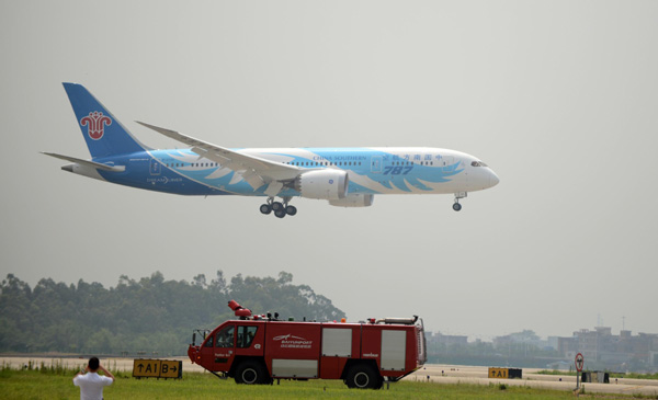 A Boeing 787 Dreamliner flight lands at Baiyun International Airport in the South China city of Guangzhou on Sunday morning. Boeing delivers country's first 787 Dreamliner