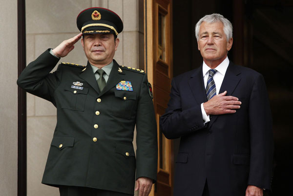 US Defense Secretary Chuck Hagel hosts an honor cordon to welcome China's Minister of National Defense General Chang Wanquan at the Pentagon in Washington August 19, 2013. China, US to enhance military cooperation