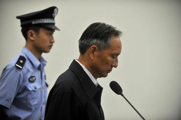 Zhang Shuguang, former director of the transport bureau for Ministry of Railways, stands trial at a Beijing court, Sept 10, 2013. Former China rail chief admits graft