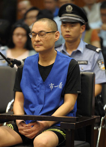 Han Lei, who was charged with the murder of a 2-year-old girl, stands trial on Sept 16 at the Beijing No 1 Intermediate People's Court. Child's killer sentenced to death