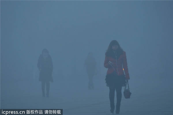 Fresh smog shrouds east, north China