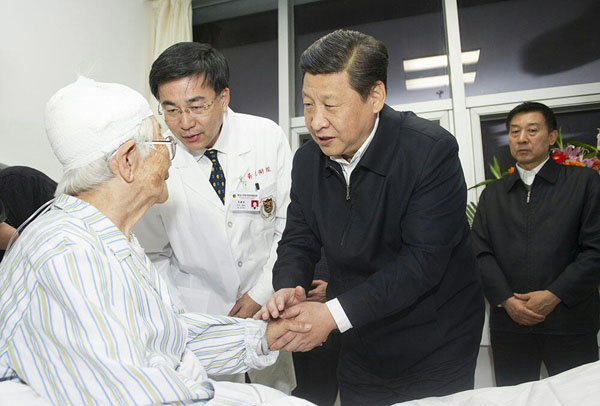 President Xi visits pipeline blast survivors