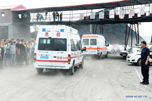 9 rescued, 16 still trapped in flooded China mine