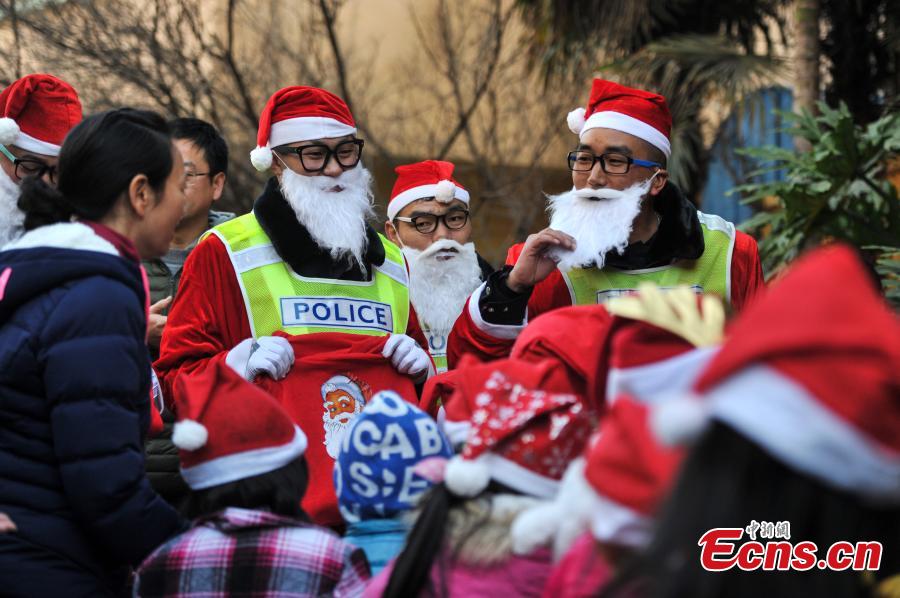 Santa traffic policemen add festivity to the streets