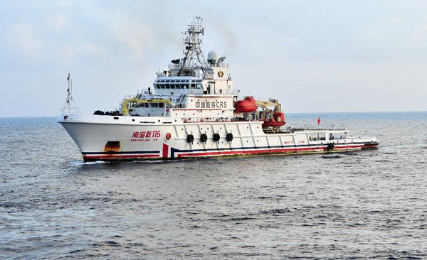 Chinese military jet, vessel join search for missing AirAsia flight